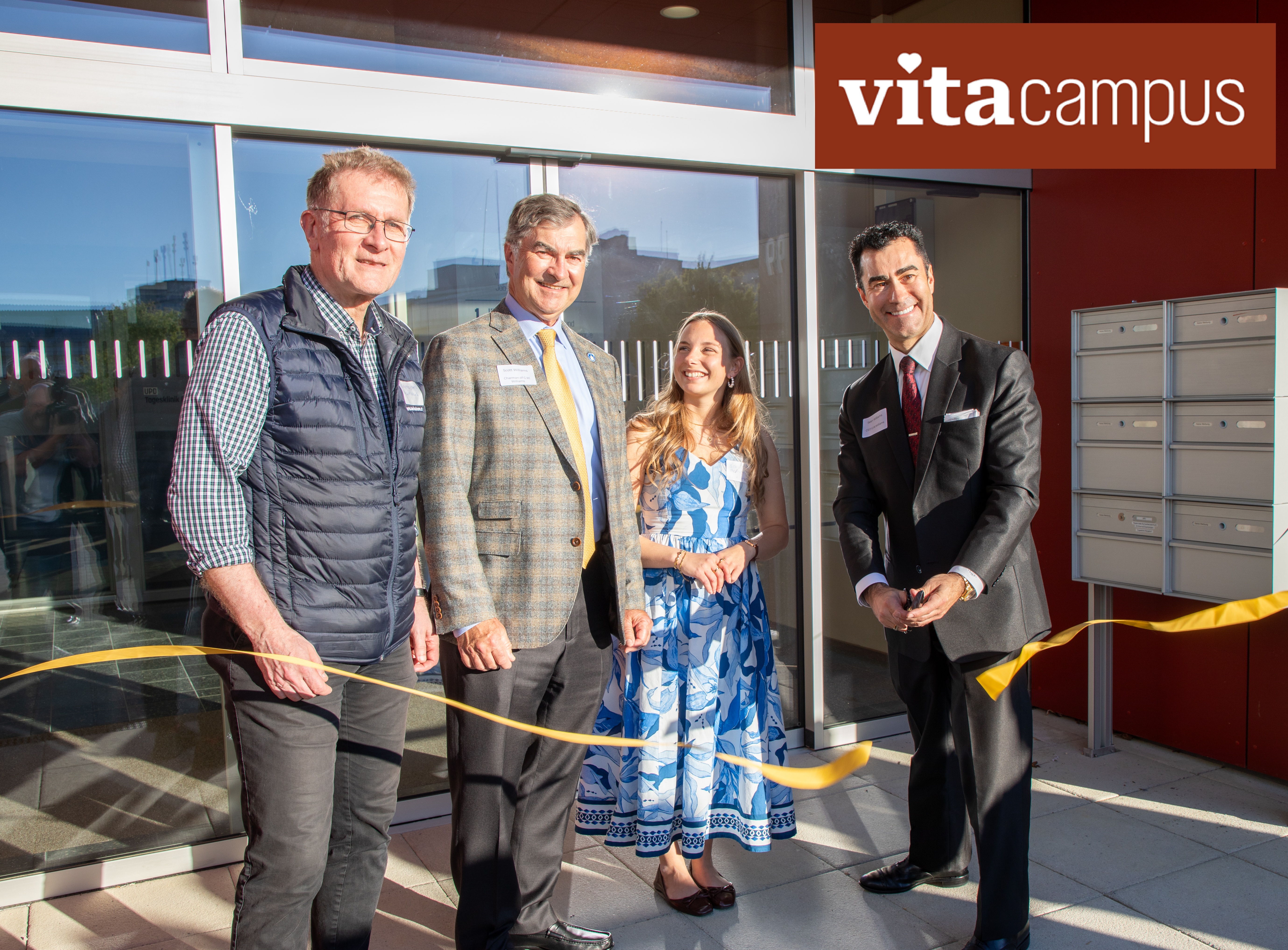 VitaCampus Burgdorf ribbon cutting ceremony with attendees and company officials celebrating the opening of Building 2
